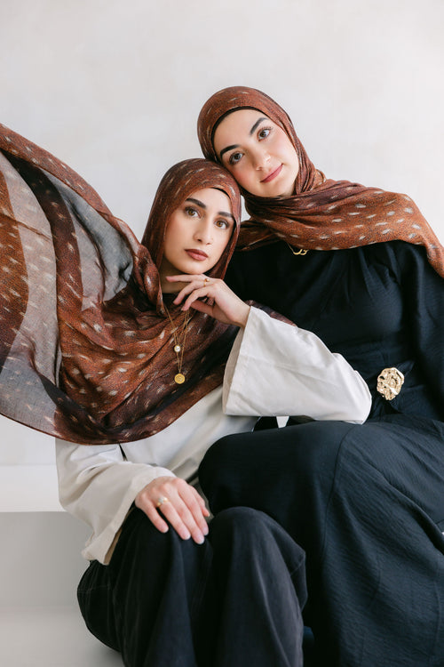 Close-up of the Bambi product from Threads by Farah featuring detailed branding and elegant design elements.