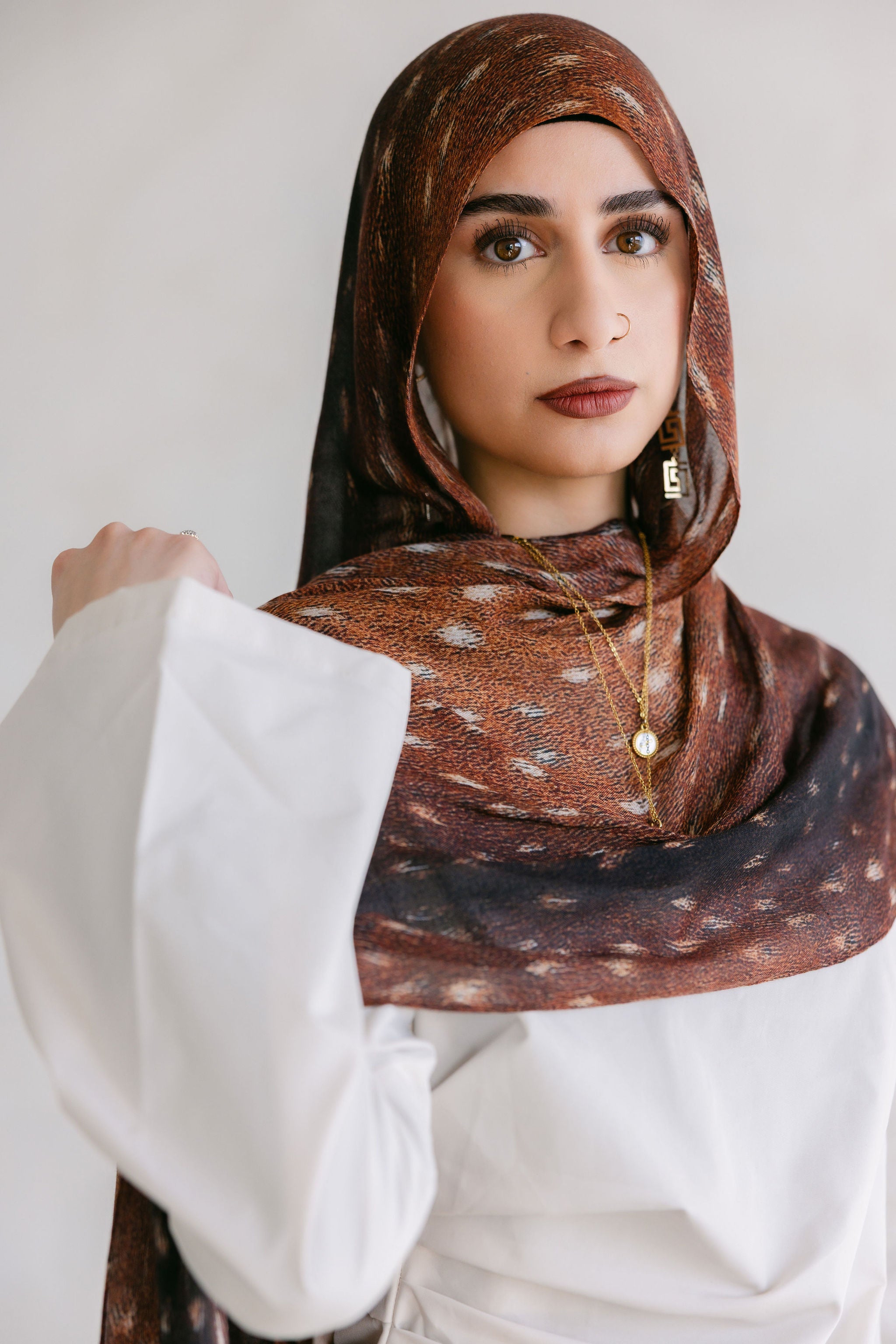 Bambi plush toy by Threads by Farah displayed on a neutral background in a professional photoshoot.