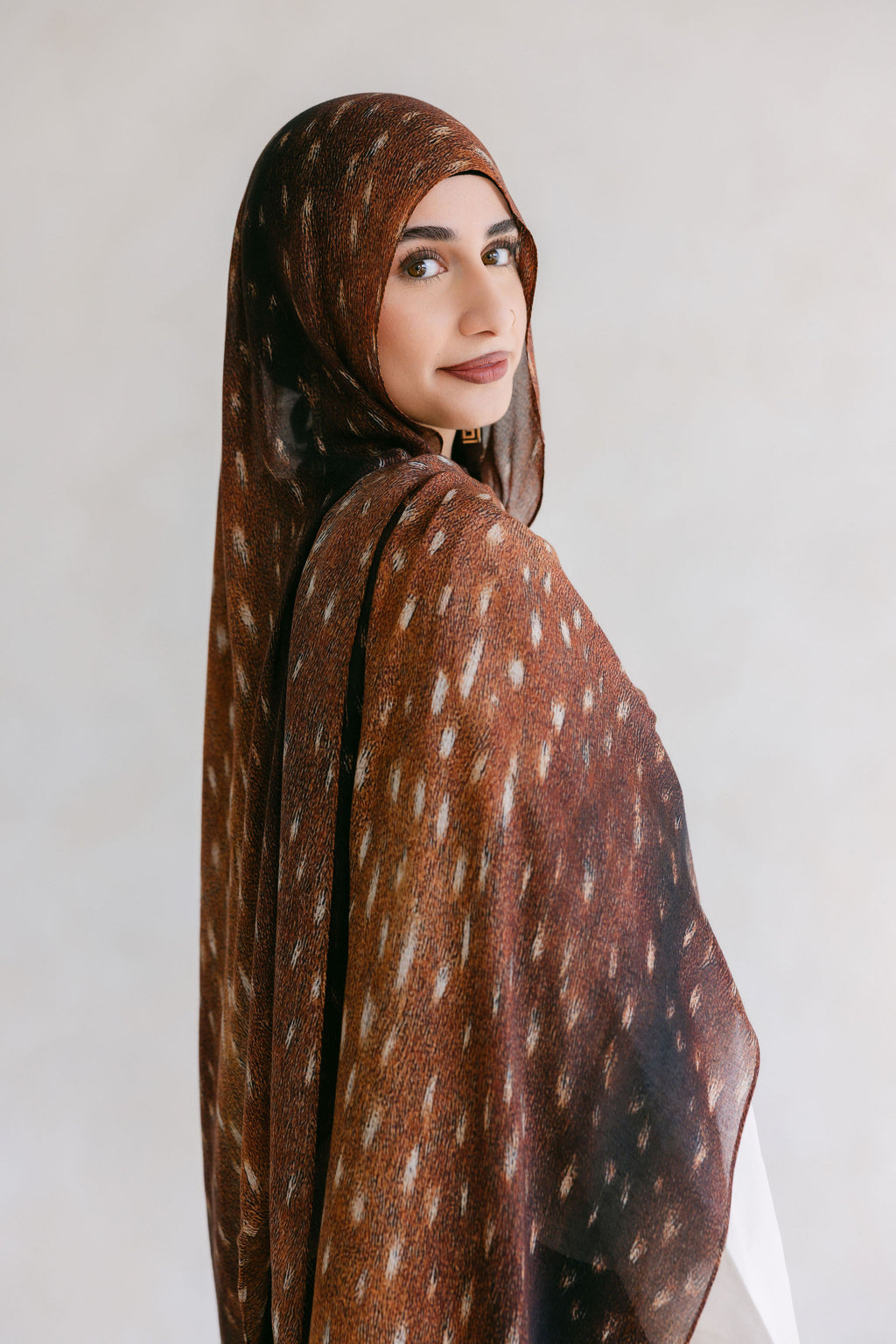 Close-up of the Bambi product from Threads by Farah, showcasing detailed design and branding elements in a professional photoshoot setting.