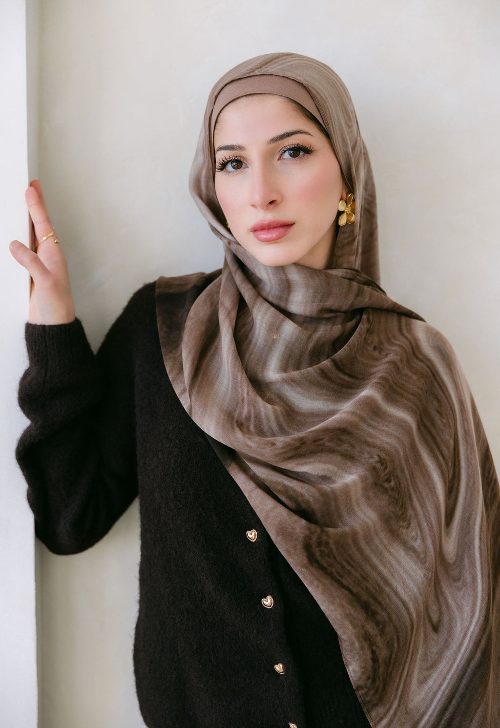 Close-up of Cocoa Swirl fabric by Threads by Farah, showcasing its rich texture and intricate pattern.