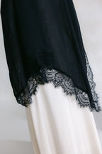Elegant white lace dress from Threads by Farah's Layla Lace collection, showcased on a model in a professional photoshoot.