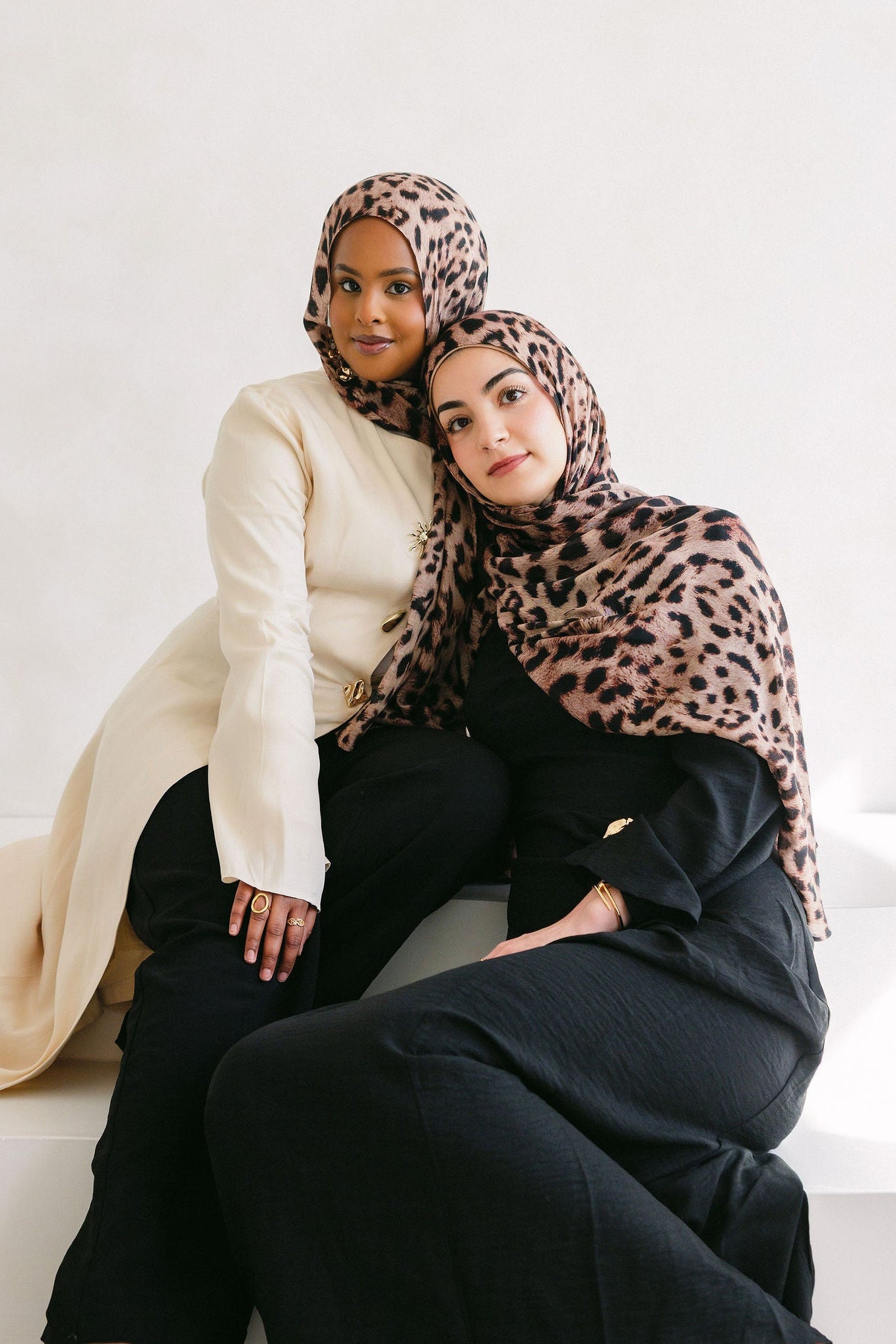 Cheetah print fabric by Threads by Farah, close-up of textured textile with vibrant animal print design.