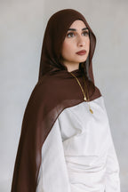 Chocolate brown Threads by Farah clothing item displayed on a model during a photoshoot, highlighting the fabric and fit.