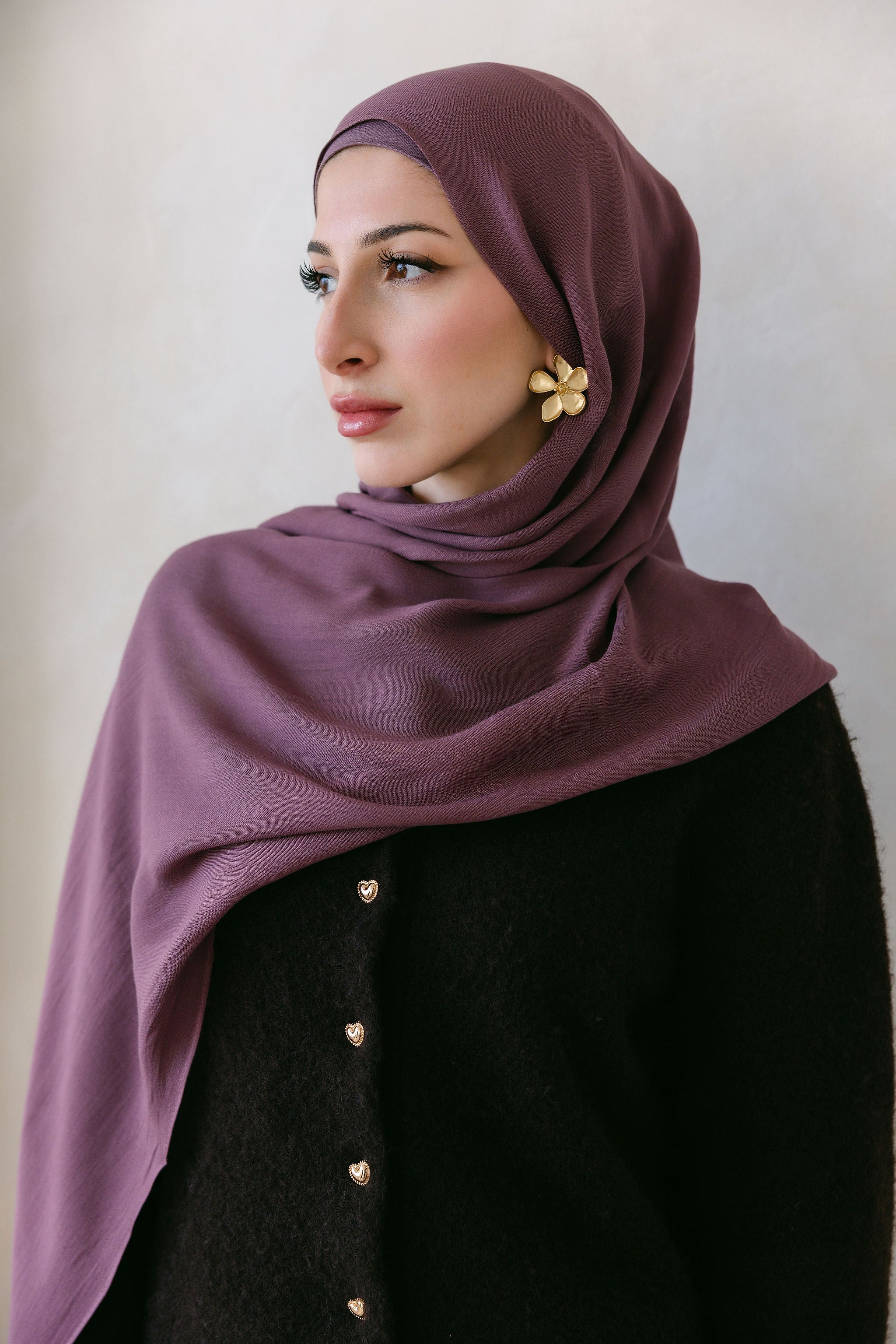 Velvet Fig from Threads by Farah, close-up of luxurious velvet fabric with rich, deep fig color and soft texture.