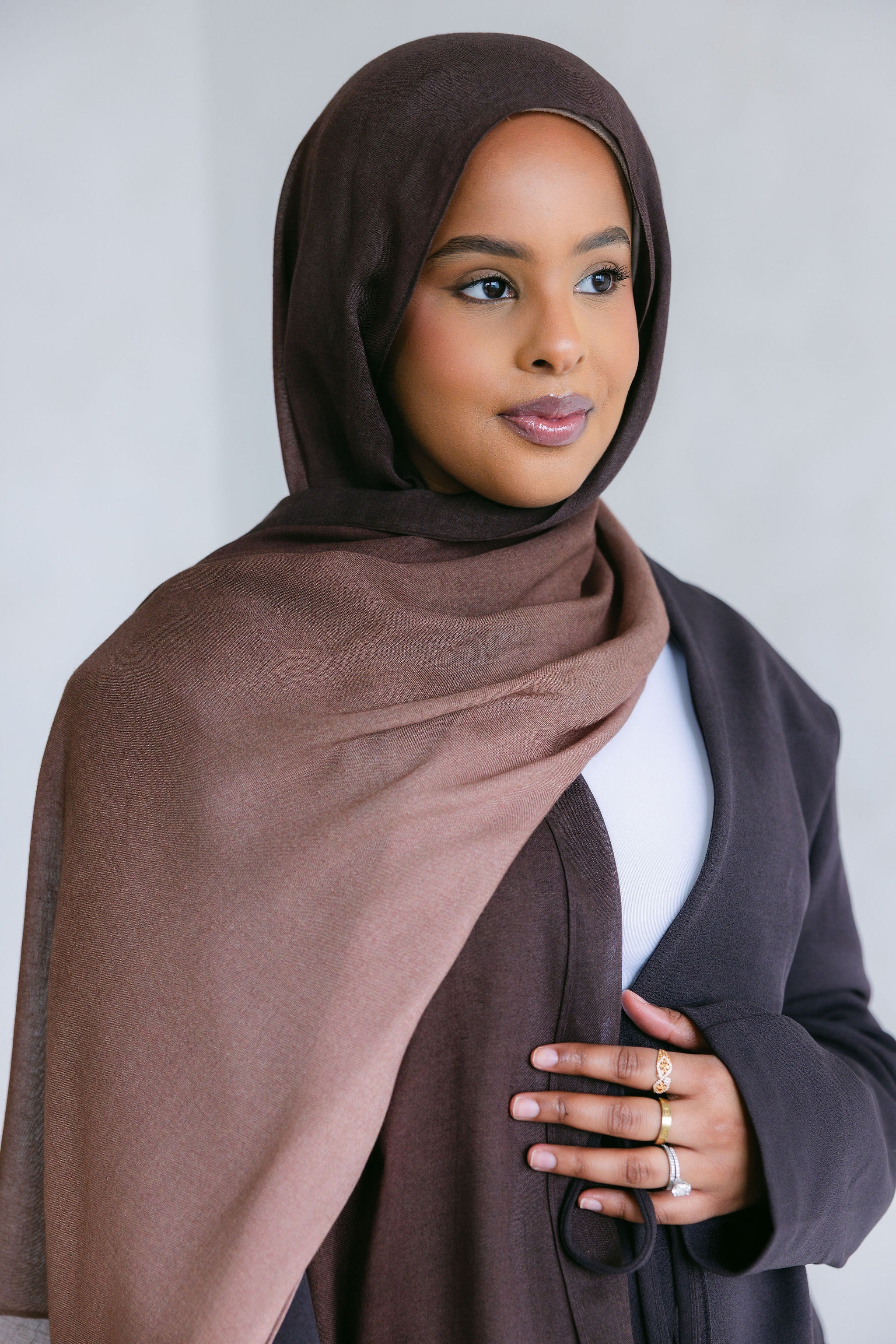 Ombre latte from Threads by Farah, featuring a beautifully blended coffee drink with layered ombre colors in a clear glass.