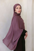 Velvet Fig product image showcasing luxurious velvet fabric in rich fig color, featuring branding details from Threads by Farah.