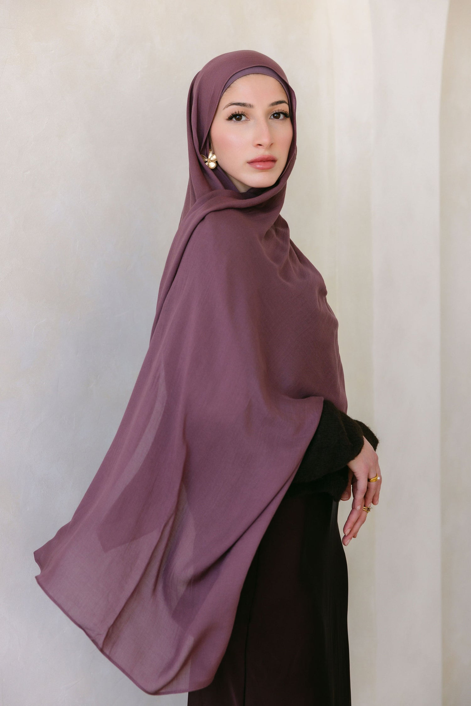 Velvet Fig product image showcasing luxurious velvet fabric in rich fig color, featuring branding details from Threads by Farah.